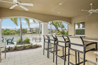 Stunning Lakefront Luxury Condo at Waterfront at Main Street on Legacy Golf Club in Florida - for sale on GolfHomes.com, golf home, golf lot