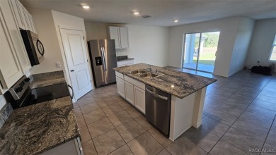 Unwind in paradise! This well-built D.R. Horton Cali one-story on Twisted Oaks Golf Club in Florida - for sale on GolfHomes.com, golf home, golf lot