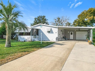 Enjoy The Villages lifestyle in this well-maintained 2-bedroom on Orange Blossom Hills Golf and Country Club in Florida - for sale on GolfHomes.com, golf home, golf lot