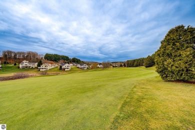 This turnkey lower level condo on 6th fairway of The Crown Golf on Bay Meadows Golf Course - Executive in Michigan - for sale on GolfHomes.com, golf home, golf lot
