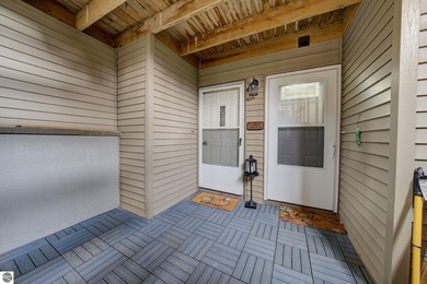 This turnkey lower level condo on 6th fairway of The Crown Golf on Bay Meadows Golf Course - Executive in Michigan - for sale on GolfHomes.com, golf home, golf lot