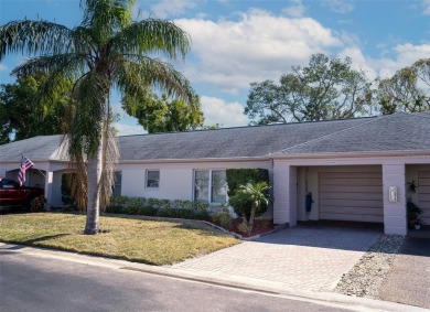 Nestled in the highly desirable 55+ community of Bardmoor, this on Bayou Golf Club in Florida - for sale on GolfHomes.com, golf home, golf lot