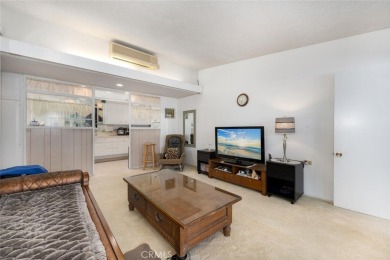 Drive-up location 1 bed/1 bath home with enclosed patio and on Leisure World Seal Beach Golf Course in California - for sale on GolfHomes.com, golf home, golf lot