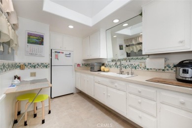 Drive-up location 1 bed/1 bath home with enclosed patio and on Leisure World Seal Beach Golf Course in California - for sale on GolfHomes.com, golf home, golf lot