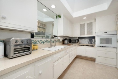 Drive-up location 1 bed/1 bath home with enclosed patio and on Leisure World Seal Beach Golf Course in California - for sale on GolfHomes.com, golf home, golf lot