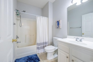 Check out this pristine 2-bedroom, 2-bath furnished villa on Barefoot Resort and Golf Club  in South Carolina - for sale on GolfHomes.com, golf home, golf lot