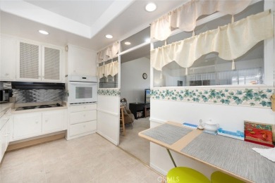 Drive-up location 1 bed/1 bath home with enclosed patio and on Leisure World Seal Beach Golf Course in California - for sale on GolfHomes.com, golf home, golf lot