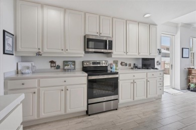 WATERFRONT FIFTH FLOOR PENTHOUSE WITH 3 BEDROOMS AND 3 FULL on Coral Creek Club in Florida - for sale on GolfHomes.com, golf home, golf lot