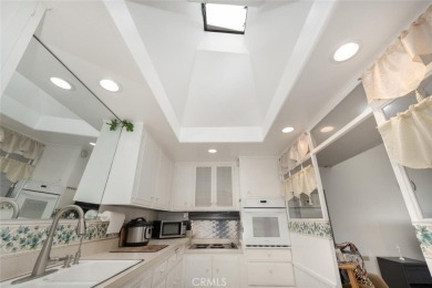 Drive-up location 1 bed/1 bath home with enclosed patio and on Leisure World Seal Beach Golf Course in California - for sale on GolfHomes.com, golf home, golf lot