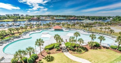 Check out this pristine 2-bedroom, 2-bath furnished villa on Barefoot Resort and Golf Club  in South Carolina - for sale on GolfHomes.com, golf home, golf lot