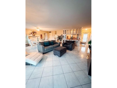 RARE & SPACIOUS 3-BEDROOM 3-BATHS WITH STUNNING LAKE & GOLF on Lauderhill Golf Course in Florida - for sale on GolfHomes.com, golf home, golf lot