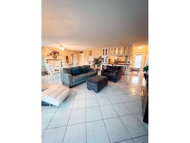 RARE & SPACIOUS 3-BEDROOM 3-BATHS WITH STUNNING LAKE & GOLF on Lauderhill Golf Course in Florida - for sale on GolfHomes.com, golf home, golf lot