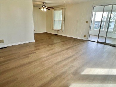 Discerning buyers who want value! Don't miss this 2 bed/2 bath on Mangrove Bay Golf Course in Florida - for sale on GolfHomes.com, golf home, golf lot