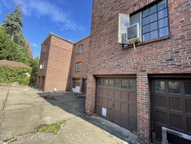 A RARE opportunity to own a well-maintained, all brick 6 family on Silver Lake Golf Course in New York - for sale on GolfHomes.com, golf home, golf lot
