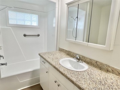Discerning buyers who want value! Don't miss this 2 bed/2 bath on Mangrove Bay Golf Course in Florida - for sale on GolfHomes.com, golf home, golf lot