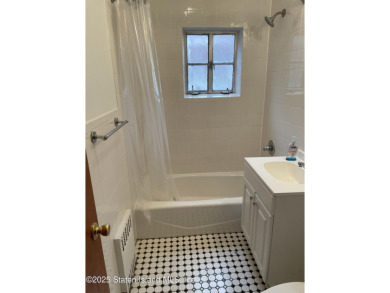 A RARE opportunity to own a well-maintained, all brick 6 family on Silver Lake Golf Course in New York - for sale on GolfHomes.com, golf home, golf lot