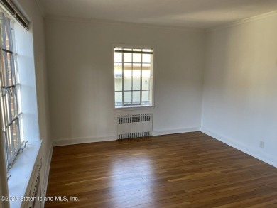 A RARE opportunity to own a well-maintained, all brick 6 family on Silver Lake Golf Course in New York - for sale on GolfHomes.com, golf home, golf lot