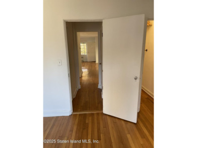 A RARE opportunity to own a well-maintained, all brick 6 family on Silver Lake Golf Course in New York - for sale on GolfHomes.com, golf home, golf lot
