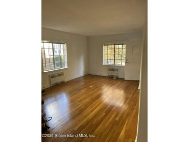 A RARE opportunity to own a well-maintained, all brick 6 family on Silver Lake Golf Course in New York - for sale on GolfHomes.com, golf home, golf lot