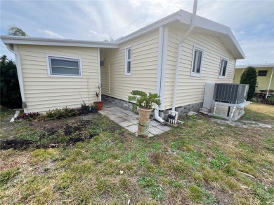 Discerning buyers who want value! Don't miss this 2 bed/2 bath on Mangrove Bay Golf Course in Florida - for sale on GolfHomes.com, golf home, golf lot