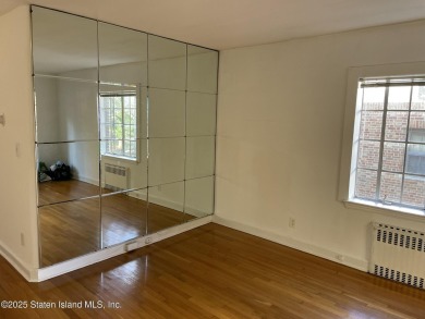 A RARE opportunity to own a well-maintained, all brick 6 family on Silver Lake Golf Course in New York - for sale on GolfHomes.com, golf home, golf lot