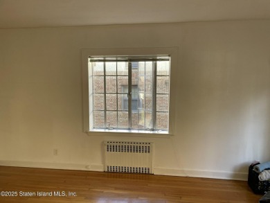 A RARE opportunity to own a well-maintained, all brick 6 family on Silver Lake Golf Course in New York - for sale on GolfHomes.com, golf home, golf lot