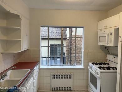 A RARE opportunity to own a well-maintained, all brick 6 family on Silver Lake Golf Course in New York - for sale on GolfHomes.com, golf home, golf lot