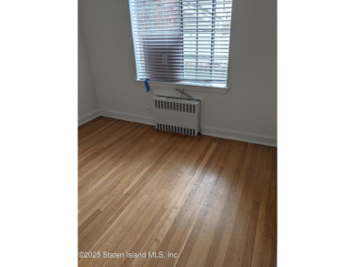 A RARE opportunity to own a well-maintained, all brick 6 family on Silver Lake Golf Course in New York - for sale on GolfHomes.com, golf home, golf lot