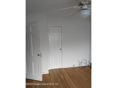 A RARE opportunity to own a well-maintained, all brick 6 family on Silver Lake Golf Course in New York - for sale on GolfHomes.com, golf home, golf lot