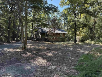 Quaint cottage near Greers Ferry Lake and all Fairfield Bay on Mountain Ranch Golf Club in Arkansas - for sale on GolfHomes.com, golf home, golf lot