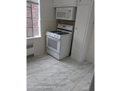 A RARE opportunity to own a well-maintained, all brick 6 family on Silver Lake Golf Course in New York - for sale on GolfHomes.com, golf home, golf lot