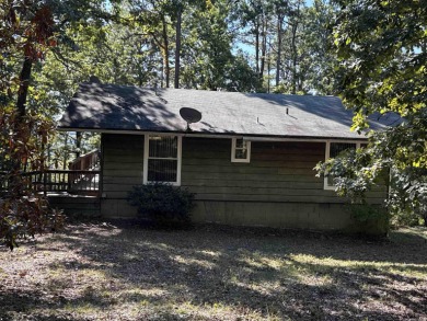 Quaint cottage near Greers Ferry Lake and all Fairfield Bay on Mountain Ranch Golf Club in Arkansas - for sale on GolfHomes.com, golf home, golf lot