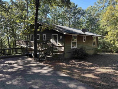 Quaint cottage near Greers Ferry Lake and all Fairfield Bay on Mountain Ranch Golf Club in Arkansas - for sale on GolfHomes.com, golf home, golf lot