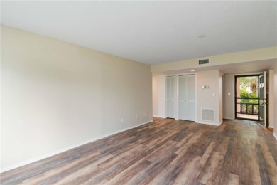 Beautifully updated and move-in ready 2-bedroom, 2-bath on Capri Isle Golf Club in Florida - for sale on GolfHomes.com, golf home, golf lot