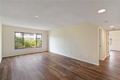 Beautifully updated and move-in ready 2-bedroom, 2-bath on Capri Isle Golf Club in Florida - for sale on GolfHomes.com, golf home, golf lot