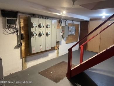 A RARE opportunity to own a well-maintained, all brick 6 family on Silver Lake Golf Course in New York - for sale on GolfHomes.com, golf home, golf lot