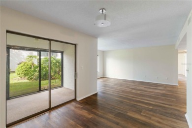 Beautifully updated and move-in ready 2-bedroom, 2-bath on Capri Isle Golf Club in Florida - for sale on GolfHomes.com, golf home, golf lot