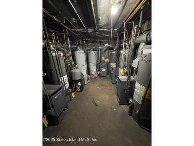 A RARE opportunity to own a well-maintained, all brick 6 family on Silver Lake Golf Course in New York - for sale on GolfHomes.com, golf home, golf lot