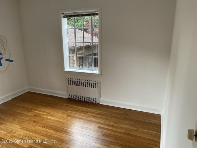 A RARE opportunity to own a well-maintained, all brick 6 family on Silver Lake Golf Course in New York - for sale on GolfHomes.com, golf home, golf lot