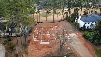 Crafted by award winning Homescapes Builders, this distinguished on North Ridge Country Club in North Carolina - for sale on GolfHomes.com, golf home, golf lot