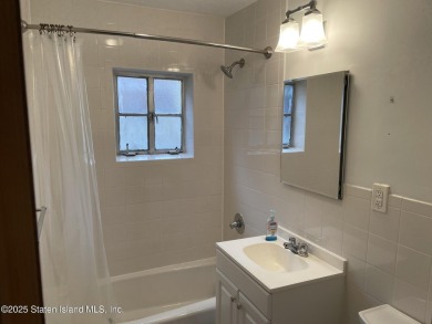 A RARE opportunity to own a well-maintained, all brick 6 family on Silver Lake Golf Course in New York - for sale on GolfHomes.com, golf home, golf lot