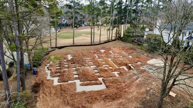 Crafted by award winning Homescapes Builders, this distinguished on North Ridge Country Club in North Carolina - for sale on GolfHomes.com, golf home, golf lot