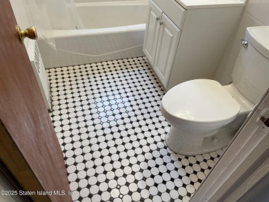 A RARE opportunity to own a well-maintained, all brick 6 family on Silver Lake Golf Course in New York - for sale on GolfHomes.com, golf home, golf lot