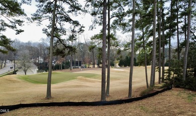 Crafted by award winning Homescapes Builders, this distinguished on North Ridge Country Club in North Carolina - for sale on GolfHomes.com, golf home, golf lot