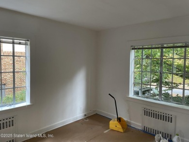 A RARE opportunity to own a well-maintained, all brick 6 family on Silver Lake Golf Course in New York - for sale on GolfHomes.com, golf home, golf lot