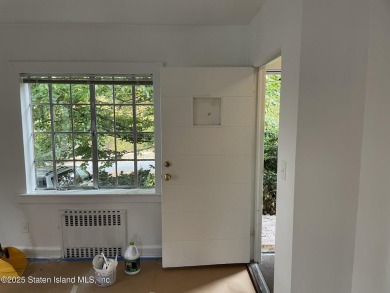 A RARE opportunity to own a well-maintained, all brick 6 family on Silver Lake Golf Course in New York - for sale on GolfHomes.com, golf home, golf lot