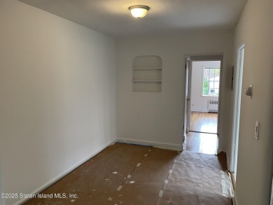 A RARE opportunity to own a well-maintained, all brick 6 family on Silver Lake Golf Course in New York - for sale on GolfHomes.com, golf home, golf lot