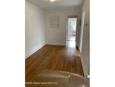 A RARE opportunity to own a well-maintained, all brick 6 family on Silver Lake Golf Course in New York - for sale on GolfHomes.com, golf home, golf lot