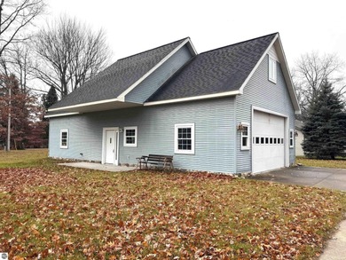 Welcome to 103 Ultra Court, a stunning golf course townhouse on Burning Oak Country Club in Michigan - for sale on GolfHomes.com, golf home, golf lot