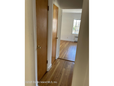 A RARE opportunity to own a well-maintained, all brick 6 family on Silver Lake Golf Course in New York - for sale on GolfHomes.com, golf home, golf lot